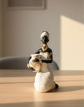 DECORATIVE RESIN FIGURINE